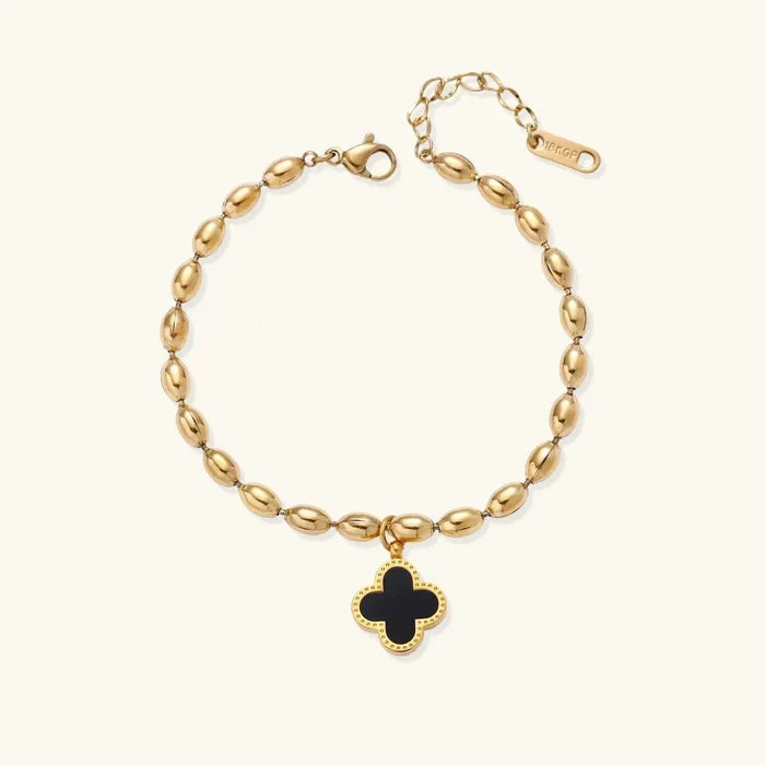 Lucky Clover 18K Gold-Plated beaded charm bracelet with polished oval gold-tone links and a black four-leaf clover charm