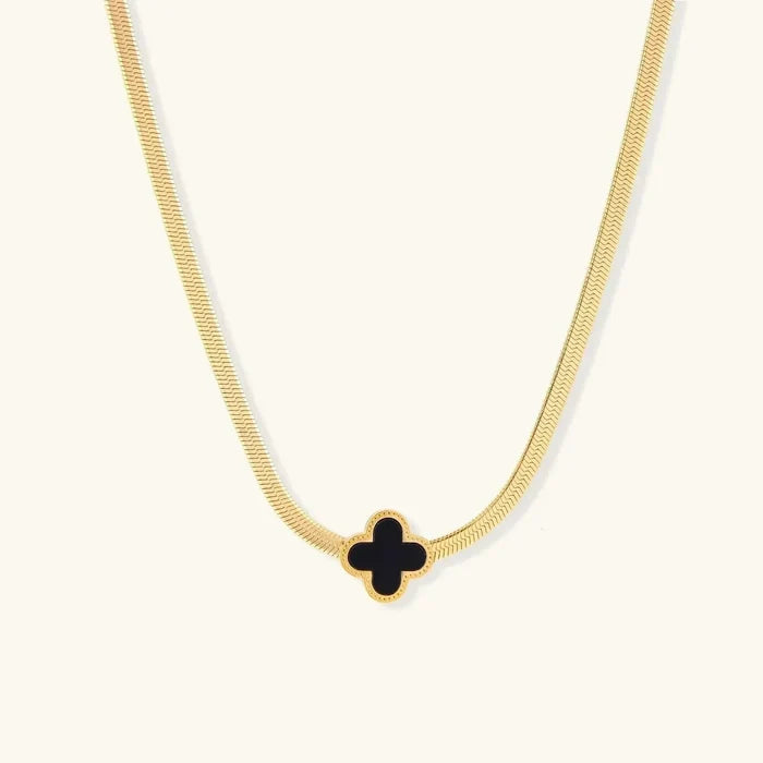 Necklace with a black enamel clover pendant, gold-tone beaded border and flat herringbone chain; Lucky Clover Black Enamel