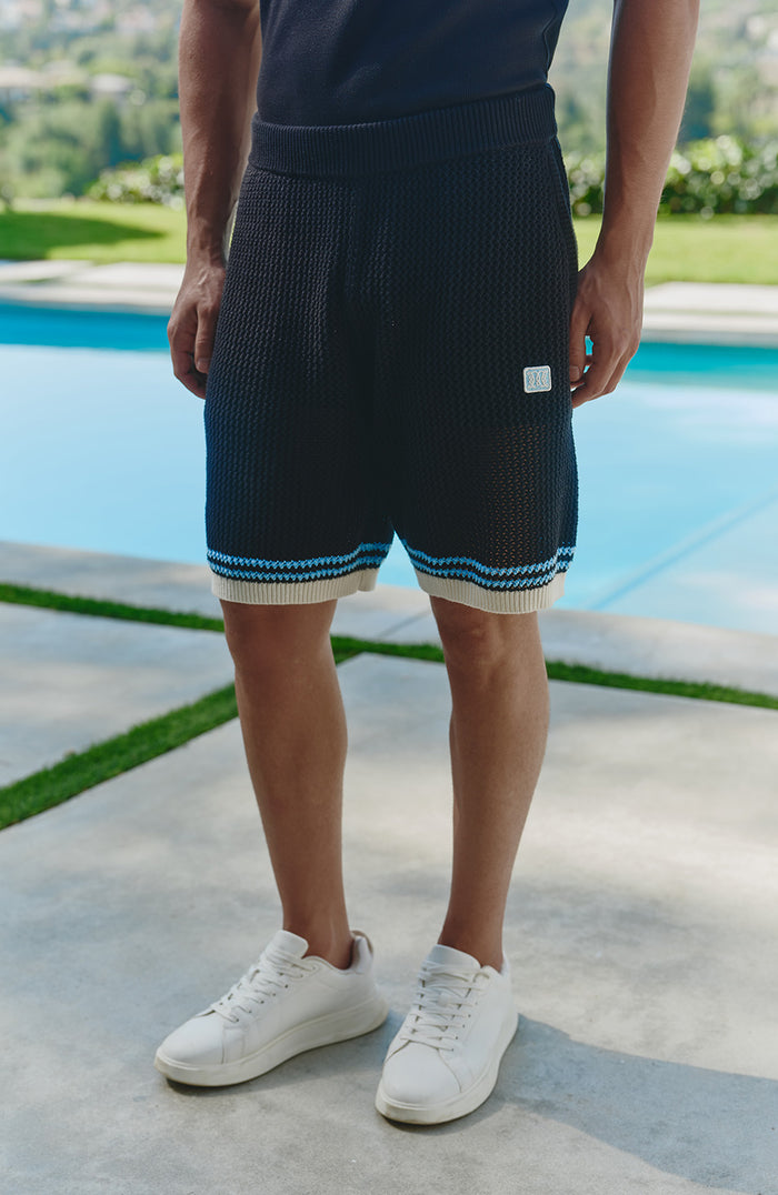 Model is 6'0 with a waist 28", wearing a W32