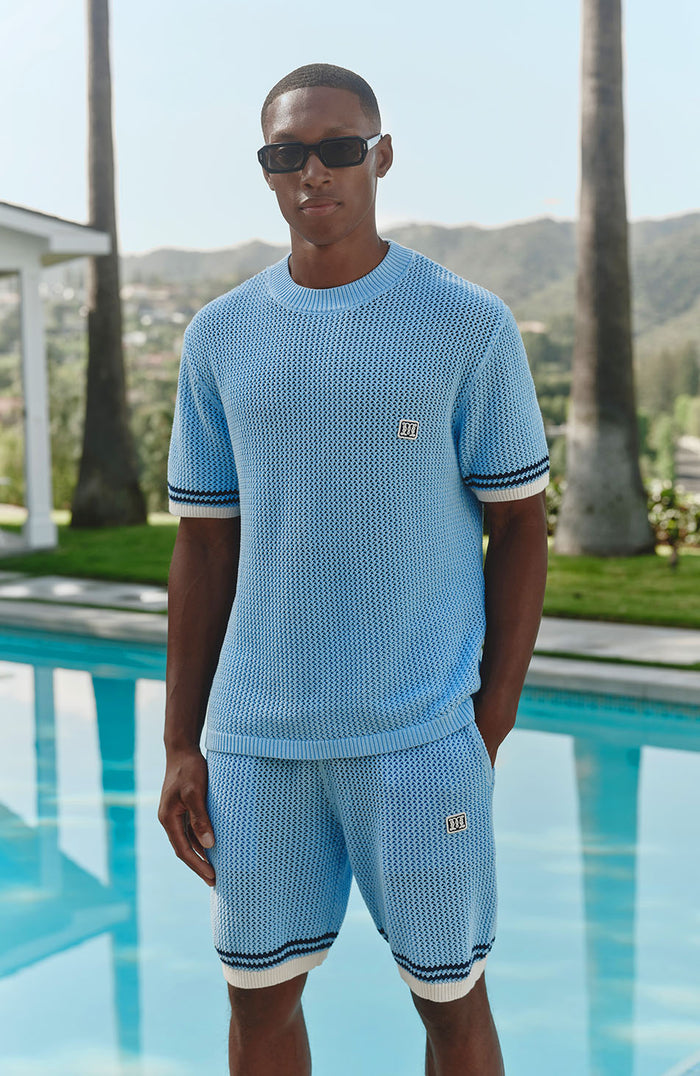 Model is 6'0 with a waist 28", wearing a W32