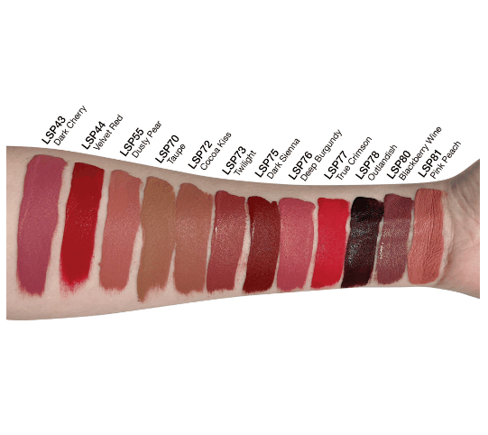 Matte Lip Stain - Dark Cherry shown as a deep rosy berry swatch among assorted matte lip stain colors on skin