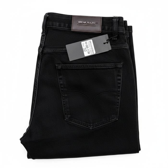 Men's black denim jeans folded white background