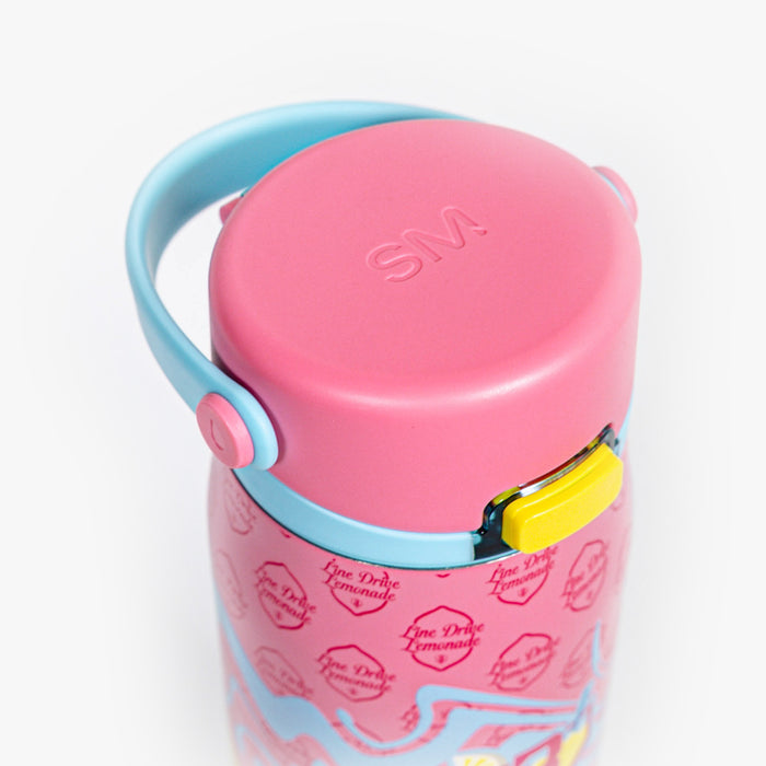 Adult model wearing pink Mesa Sport Water Bottle Lemonade bottle