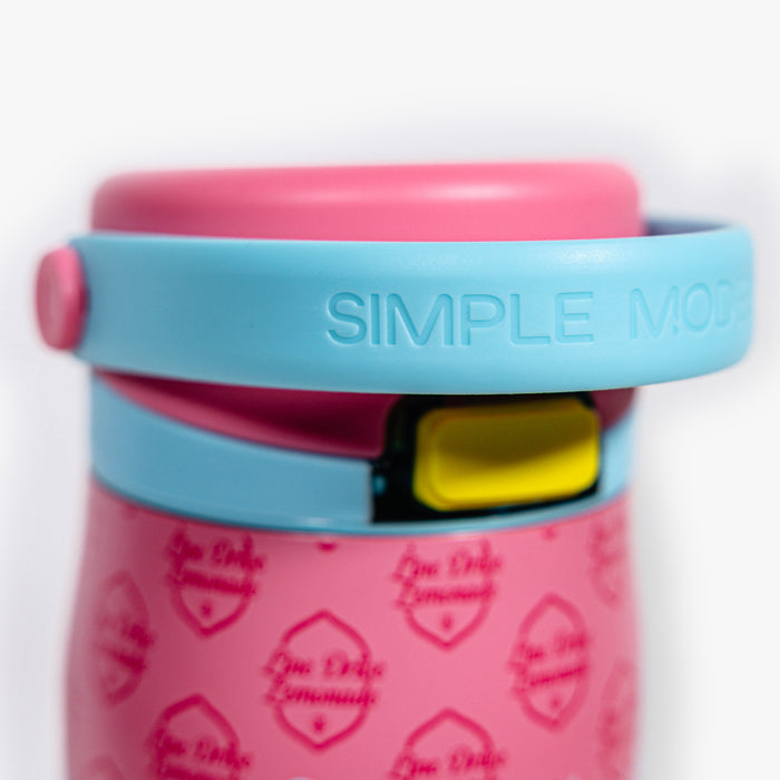 Adult model wearing pink Mesa Sport Water Bottle Lemonade bottle