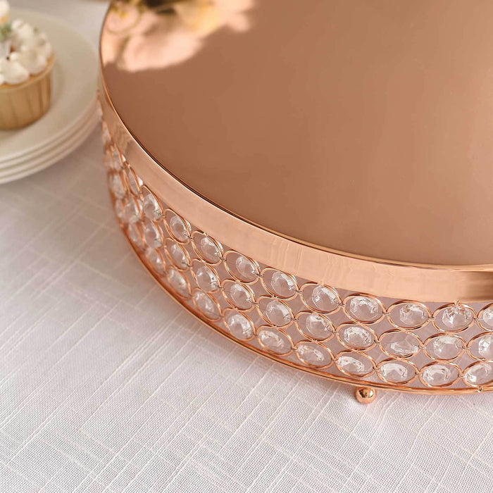 Elegant rose gold cake stand with crystal accents.