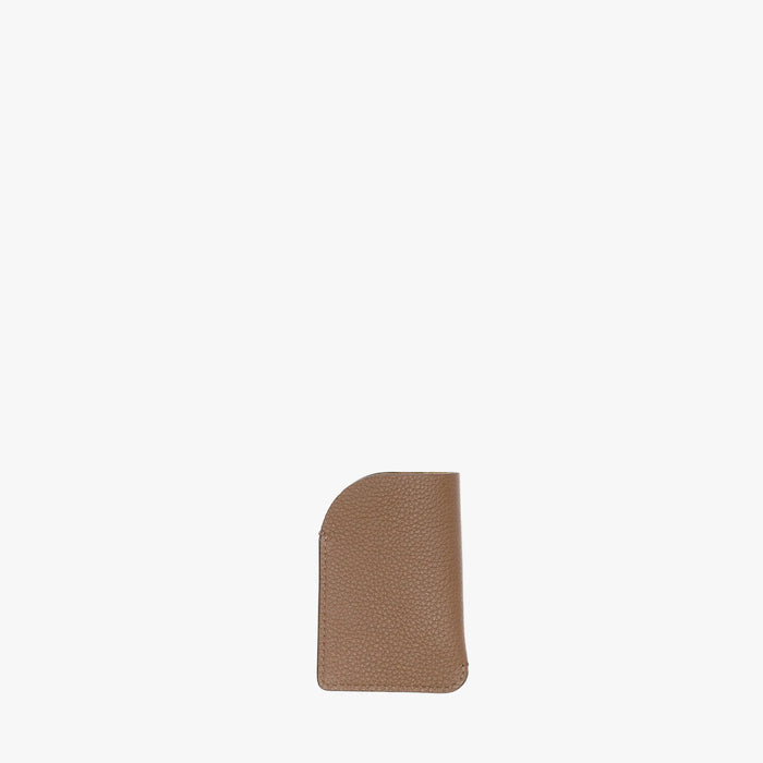 Back panel of STOW London's Mini Cardholder in Mocha pebbled leather on a light grey background