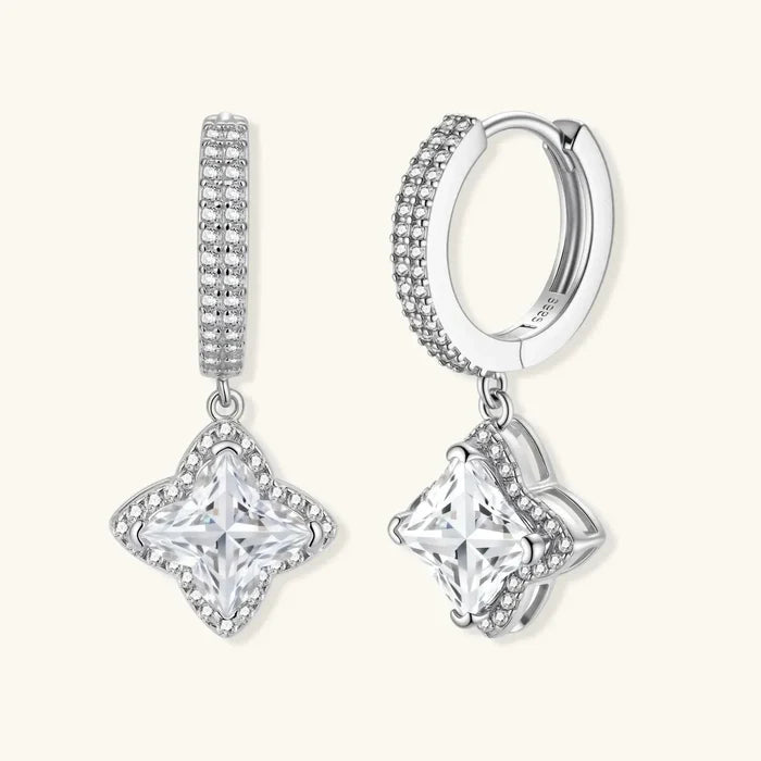 Moissanite Star Halo Dangle Huggie Earrings in silver-toned metal with crystal-set hoops and star-shaped halos around clear square stones