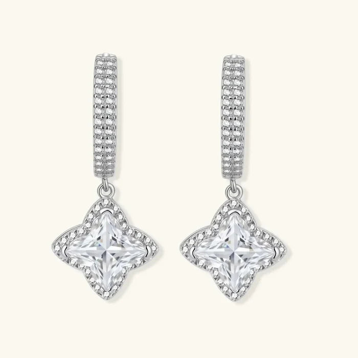Moissanite Star Halo Dangle Huggie Earrings in silver-toned metal with crystal-set hoops and clear four-point star halos