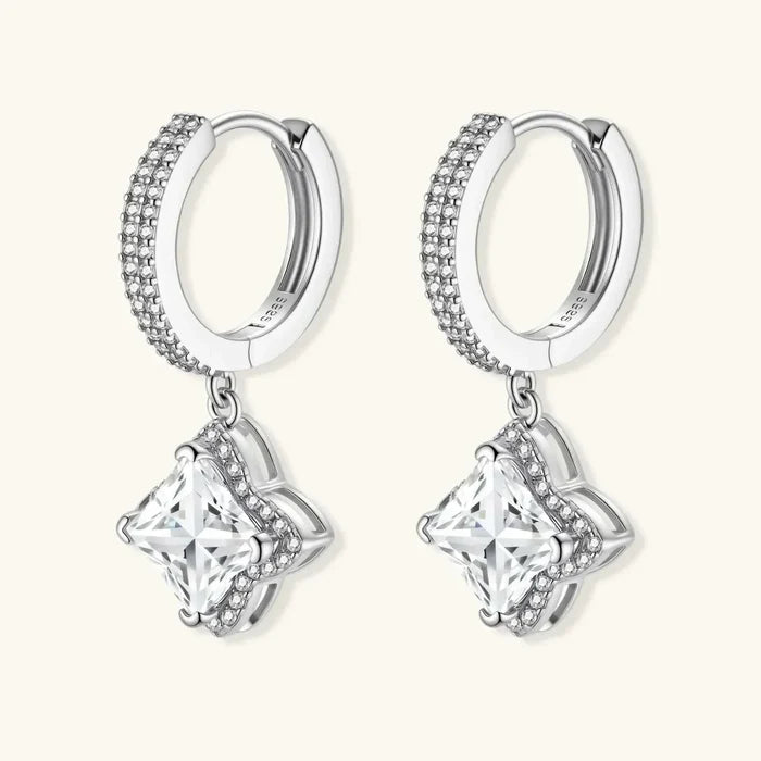 Moissanite Star Halo Dangle Huggie Earrings in silver-toned metal, with crystal-studded hoops and clear square-cut stones in halo settings
