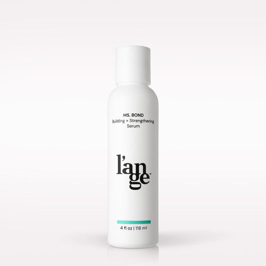 L’ange Ms. Bond Building + Strengthening Serum on a blank background