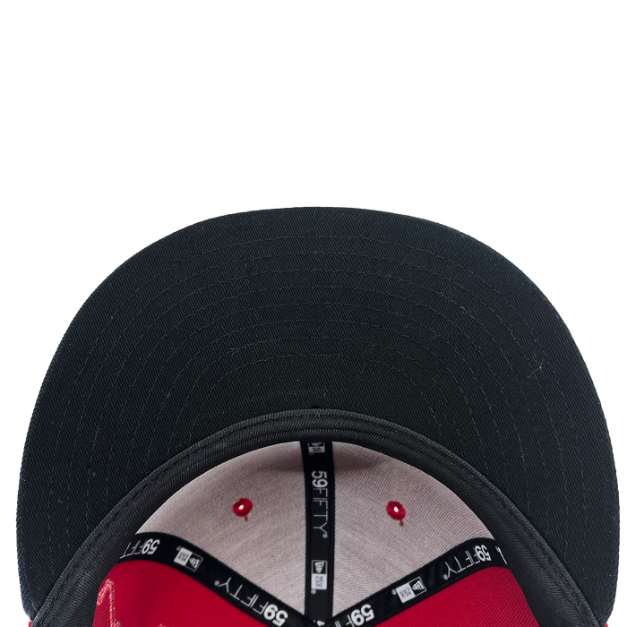 Top-down view of a black, flat-brimmed New Era El Aguila Alt 59FIFTY Cap by Other, featuring a red and grey inner lining. The inside displays black tape with “59FIFTY” printed in white and includes red stitching. An LMB logo is visible, all set against a plain white background.