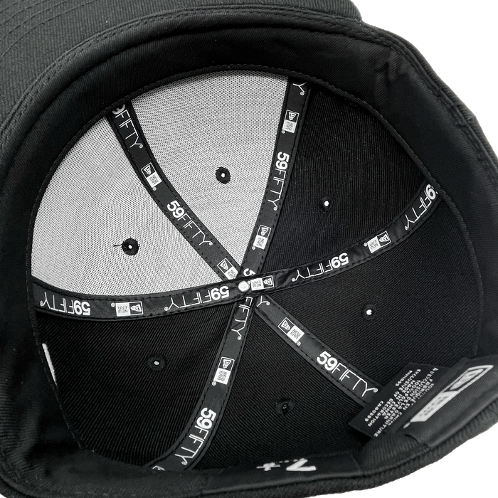 5950 New Era taping on inside of hat.