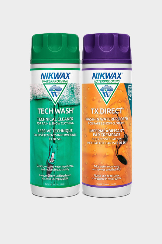 Two upright bottles of the 686 Nikwax Hardshell DuoPack‚ÄîTech Wash (green label) and TX.Direct (orange label)‚Äîfor rain and snow clothing, shown against a plain white background.