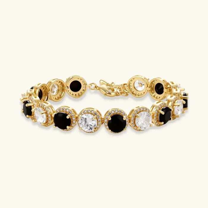 Noir Luxe Black & Clear bracelet with alternating black and clear round stones in gold-tone pavé halo settings