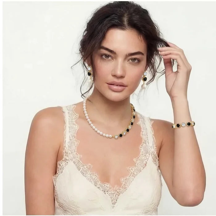 Noir Luxe Black & Clear jewelry set in gold-tone metal with black and clear stones, pearl necklace, drop earrings and bracelet