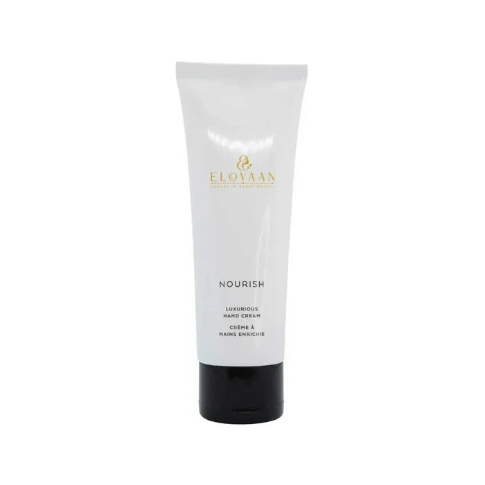 Nourish Hand Cream in a white tube with a black cap and gold lettering, featuring a sleek, minimalist design.