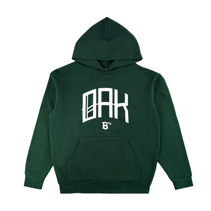 The OAK Ballers Hoodie by Oakland Ballers is a dark green hooded sweatshirt featuring a large kangaroo pocket, "OAK" in bold white letters, and a small "B's" logo below on the front, shown laid flat on a white background.