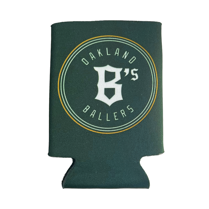 A green Oakland Ballers 12oz Can Cooler featuring a circular emblem with "OAKLAND BALLERS" text at the top and bottom, surrounding a stylized "B's" in the center. The design, representing Oakland's professional baseball team in the Pioneer League, is in white with a gold outline.
