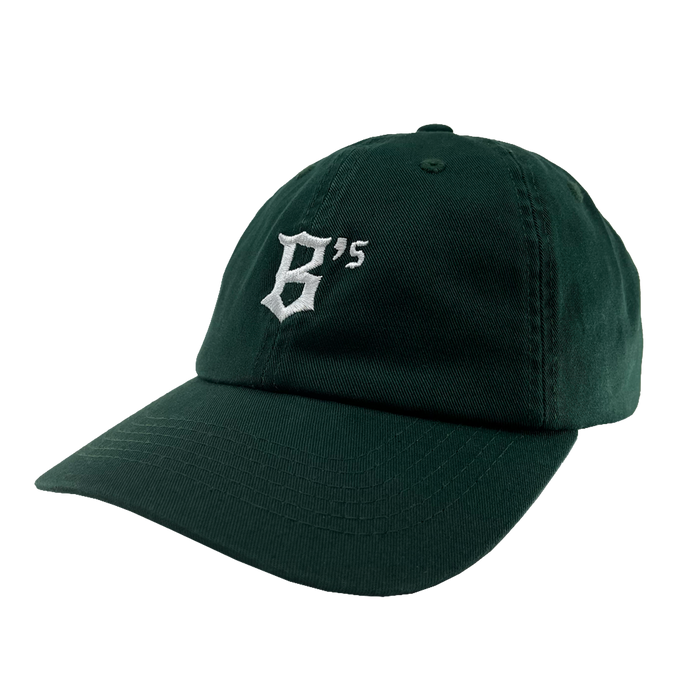 Angled side view of green Oakland Ballers Dad Hat.