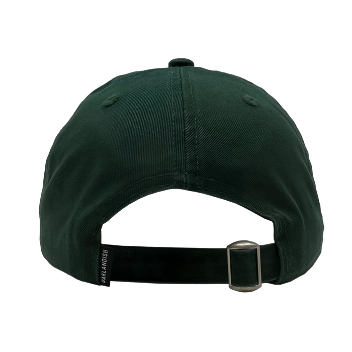 Angled side view of green Oakland Ballers Dad Hat , with adjustable strapback, and small Oaklandish wordmark tag.