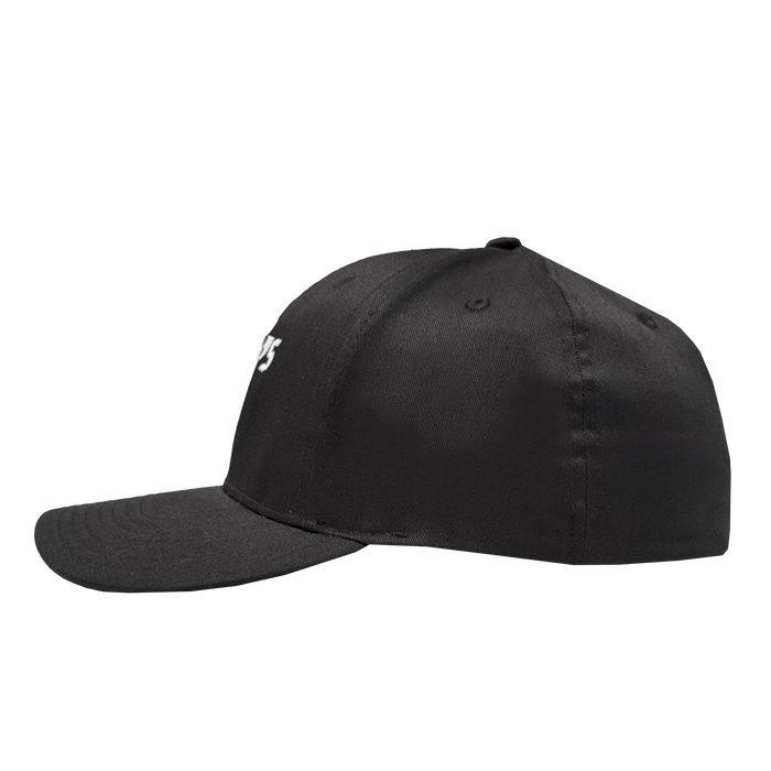 A black Oakland Ballers Flexfit Cap, shown from the left side, features a curved brim and smooth polyester fabric. Partially visible white "Oakland Ballers" lettering appears on the front, with no other logos or embellishments.