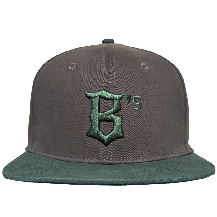 The Oakland Ballers Logo Hat by Oakland Ballers features a gray cap with a green brim and green "B’s" gothic embroidery on the front, ideal for Pioneer League fans. Shown front-facing on a plain white background.