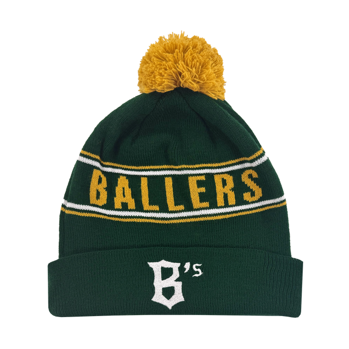 The Oakland Ballers Pom Beanie features a green knit design with a yellow pom-pom, "BALLERS" in yellow lettering, and a white stylized "B’s" logo framed by white stripes on the folded brim. Celebrate your team in style!.