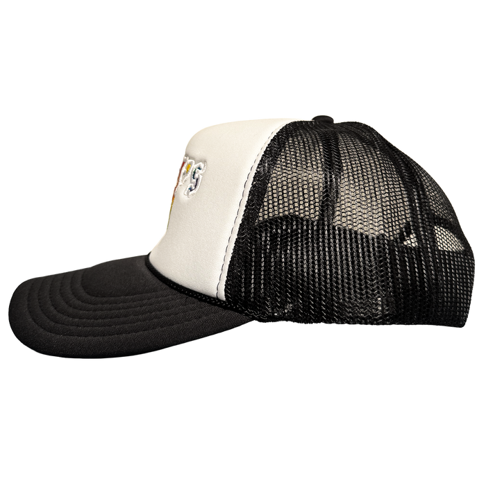 A side view of the Oakland Ballers Pride Trucker by Oakland Ballers shows a black curved brim, white front panel, black mesh back, and colorful embroidered text on a plain white background.