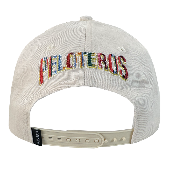 The Oakland Beisbol 5 Panel Cap by Oakland Ballers is a white snapback shown from the back with "PELOTEROS" in multicolored thread, an adjustable white plastic strap, and a black "CAP SLAM USA" tag on the side.