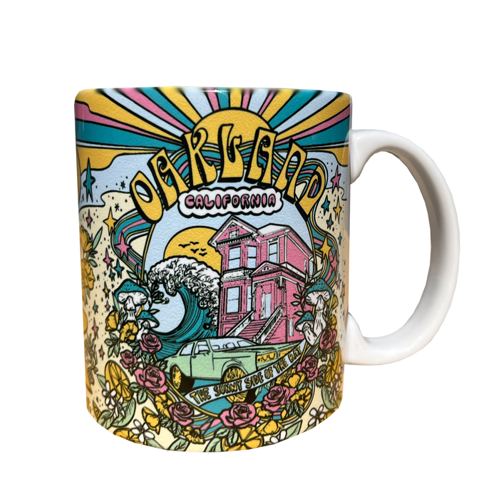 Angle view of Oakland Dream mug with Oakland dream all over print and C handle.