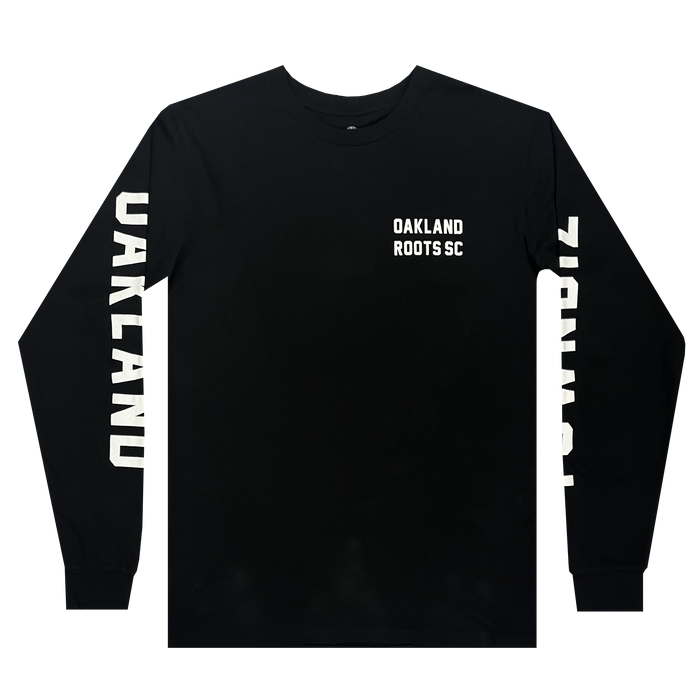 The Oakland Roots SC Classic 2.0 LS Tee, by Oakland Roots SC, is a black long sleeve t-shirt featuring the text "OAKLAND ROOTS SC" on the left chest area. "OAKLAND" is printed vertically in large white letters on the right sleeve, and "ROOTS" decorates the left sleeve. Perfect for any Oakland Roots sports club fan.