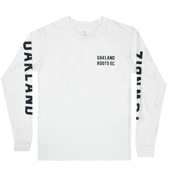 The Oakland Roots SC Classic 2.0 LS Tee features a white long-sleeve design with "OAKLAND ROOTS SC" printed in black on the upper left chest area. The word "OAKLAND" runs vertically down the length of both sleeves in bold black letters, making it the perfect apparel to showcase your support for Oakland Roots SC.