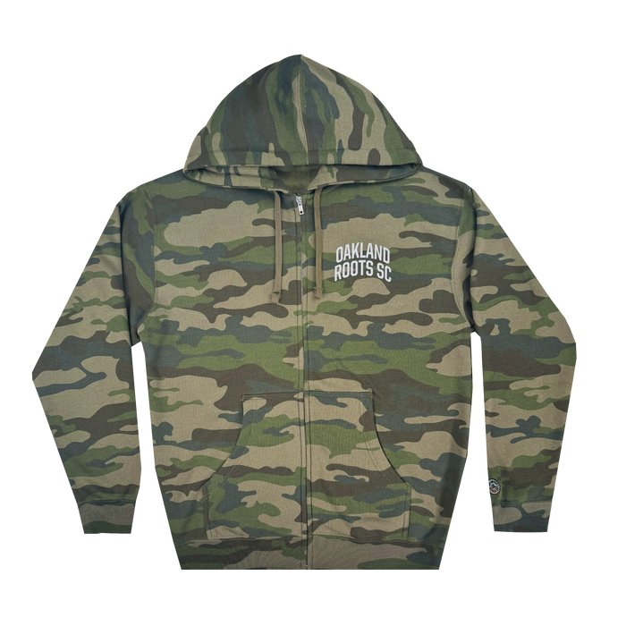 The Oakland Roots SC Classic Zip Hoodie by Oakland Roots SC is a camouflage-patterned zip-up with a hood and long sleeves, featuring woodland shades of green and brown. "OAKLAND ROOTS SC" is printed in white on the left chest, representing the dynamic sports club.