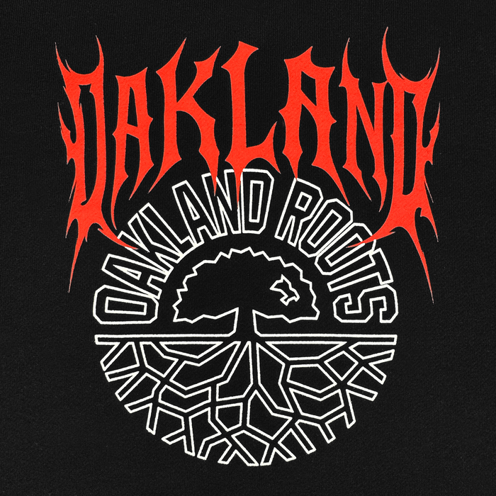 The Oakland Roots SC Forge Hoodie by Oakland Roots SC showcases bold, jagged red "OAKLAND" text above a white circular logo with a stylized tree—branches on top, geometric roots below—set against black, ideal for fans.