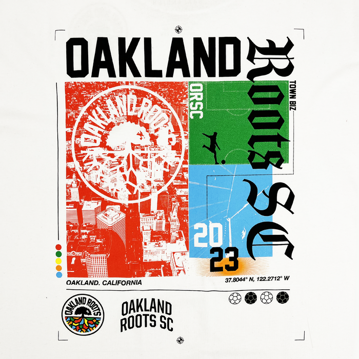 Show off your Oakland pride with the Oakland Roots SC Futbol Town Tee by Other, featuring bold “OAKLAND ROOTS SC” lettering, a striking red cityscape background, the Roots SC logo, vibrant green and blue panels with a soccer player, “2023,” GPS coordinates, and “OAKLAND, CALIFORNIA.” A circular Oakland Roots Sports Club logo anchors the design amid bright colors—perfect for fans seeking an iconic t-shirt that celebrates this spirited city.