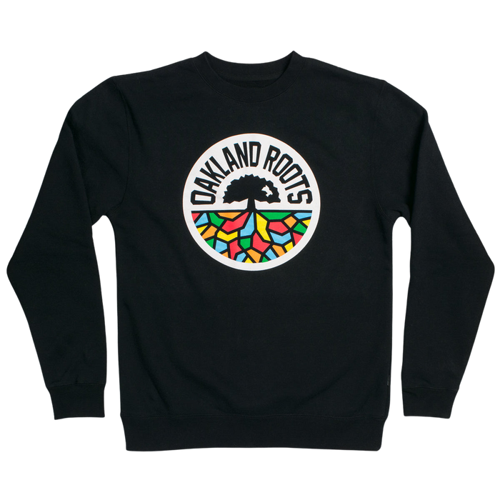 Full-color ROOTS SC mosaic circle logo on the chest of a black crew neck sweatshirt.