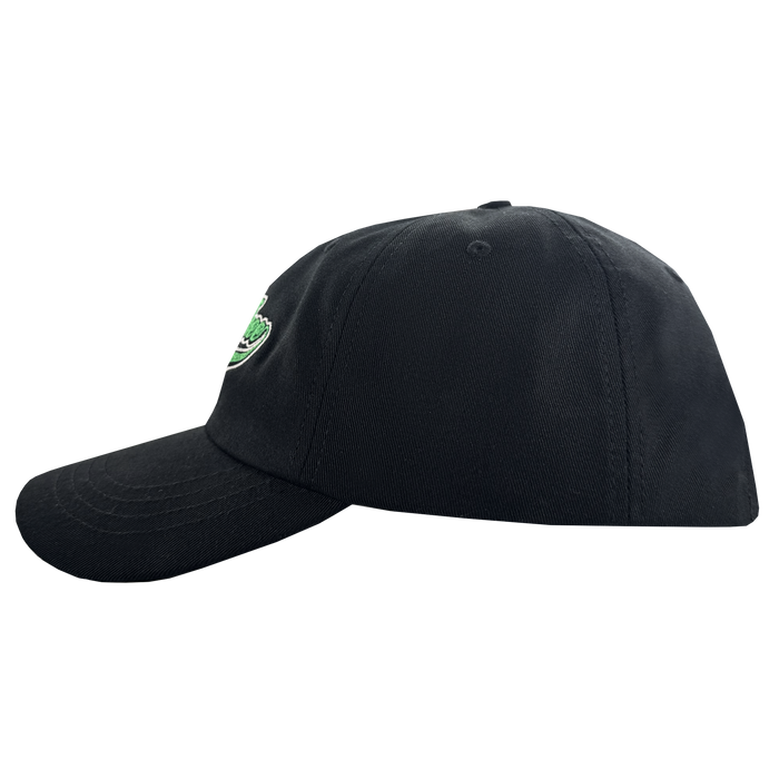 The Oakland Roots SC X Break Free Hat by Oakland Roots SC is shown in profile, facing left. The black cap has a curved brim, visible stitching, and a small green and white embroidered logo on the front. Background is light gray.