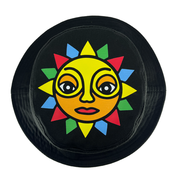 The Oakland Soul & Roots SC Reversible Bucket by Oakland Roots SC is a circular black bucket hat featuring a vibrant, artistic sun face design. The sun has a yellow face with expressive eyes, a small nose, and red lips. Its rays alternate in red, green, yellow, and blue colors, capturing the essence of Oakland Soul and Oakland Roots.
