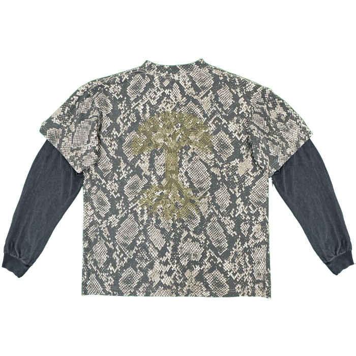The Oaklandish Classic Logo LS Tee by Oaklandish features vintage black long sleeves with a short-sleeve overlay in a gray snakeskin pattern, reminiscent of a classic layered look. The back showcases an oversized gold embroidered tree logo with intricate metallic detailing on the roots and branches. Crafted from 100% cotton, this shirt is displayed flat against a white background.