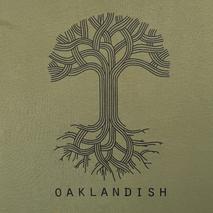 The Oaklandish Classic Logo Tee by Oaklandish features a stylized black tree with interwoven branches and roots on an olive-green background, "OAKLANDISH" below, and a minimalist geometric design on a men’s cotton T-shirt.