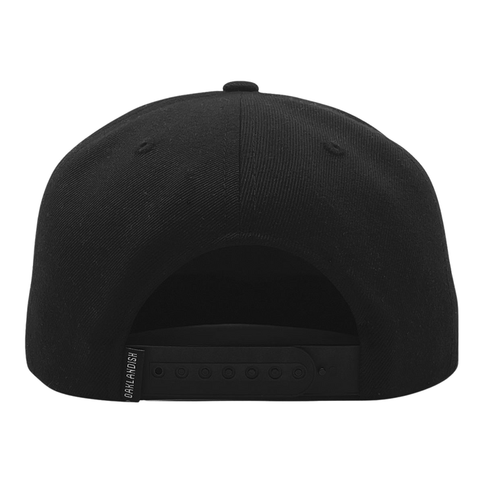 The image displays the back view of the Oaklandish Classic Snapback, showcasing stylish headwear from Oaklandish. The black cap features a flat, round crown with a plastic adjustable strap at the back and a small tag on the left side that reads "ORIGINAL FOUR." The background is plain white.