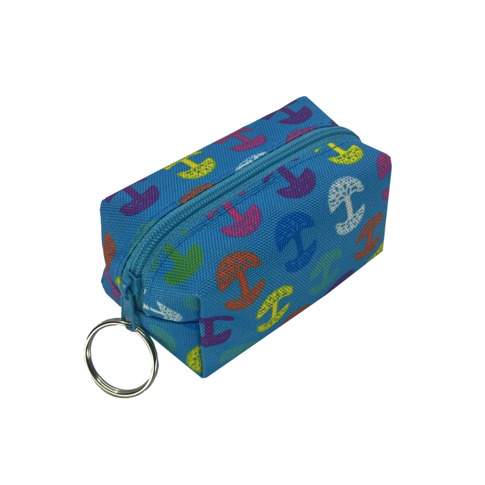 The Oaklandish Repeat Tree Mini Dopp by Oaklandish is a small, rectangular polyester keychain pouch adorned with colorful anchors in red, yellow, green, orange, and purple. This mini keychain pouch features a metal keyring attached to one end for easy attachment to keys or other items and has a top zippered compartment that is closed.