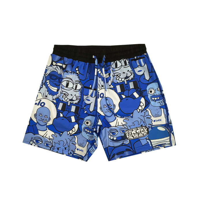 Supported Brands OG Swim Trunks feature a blue and black cartoon print with abstract, humorous faces and quirky doodles, plus a black elastic waistband. Made from comfy spandex for playful style and comfort.