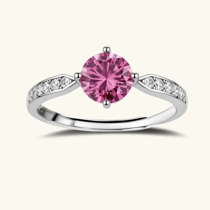 Pink Dreams Moissanite adjustable ring in polished sterling silver, with a round pink stone and clear pavé shoulder accents