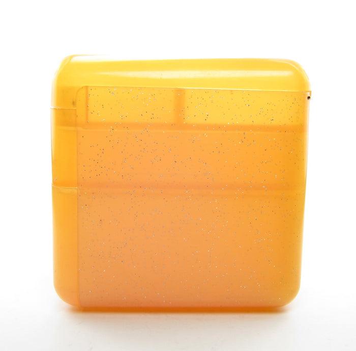 Pink and yellowed orange plastic on Little Twin Stars drawer box