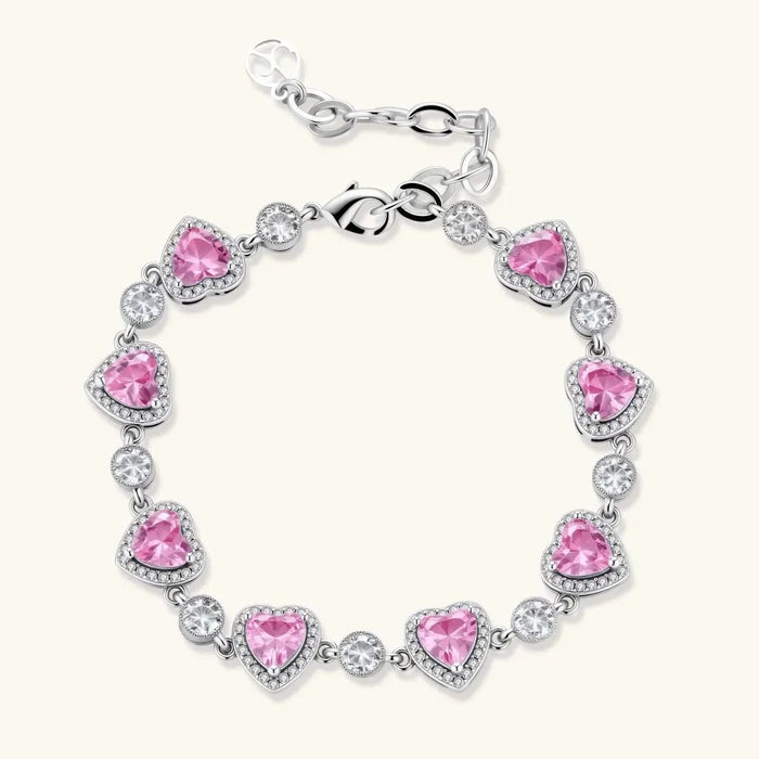 Pink Heart Zirconia bracelet in silver-tone metal with pink heart-cut stones, clear sparkling halos and round accents