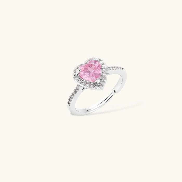 Pink Heart Zirconia ring with a sparkling pink heart-cut stone, clear halo and polished silver-tone adjustable band