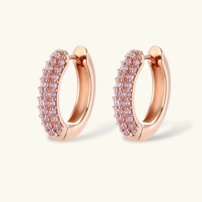 Pink Pavé Zirconia Necklace set shown with rose gold-toned hoop earrings featuring two rows of pale pink stones