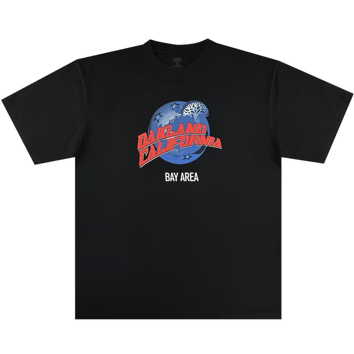 The Oaklandish Planet Oakland Tee is a black, 100% cotton classic fit shirt featuring a blue NASA-style logo with white stars and a tree, red "Oakland California," and white "Bay Area" text centered on the chest.