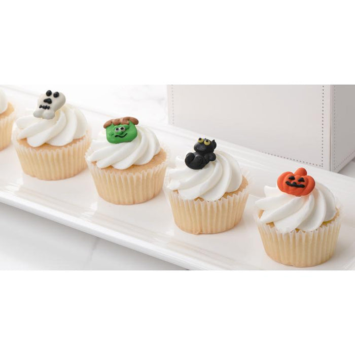 Halloween Royal Icing Toppers for decorating your own cupcakes, chocolates, cookies, cakes, and other desserts. Edible hand piped icing toppers ready to use on your food.